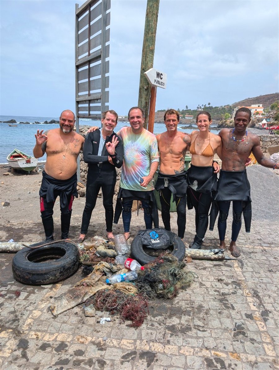 Cleanup team with collected debris